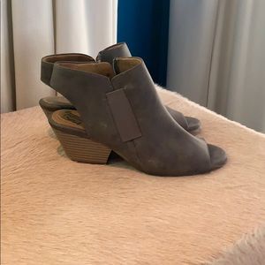 TWO OPEN TOED BOOTIES